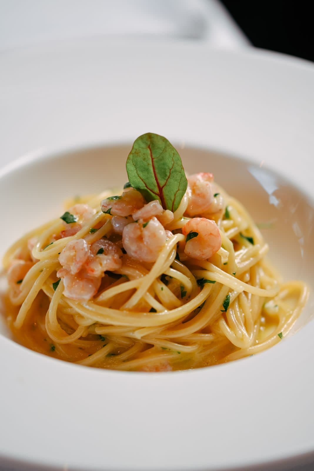 Shrimp linguine tossed in a light garlic sauce with fresh herbs