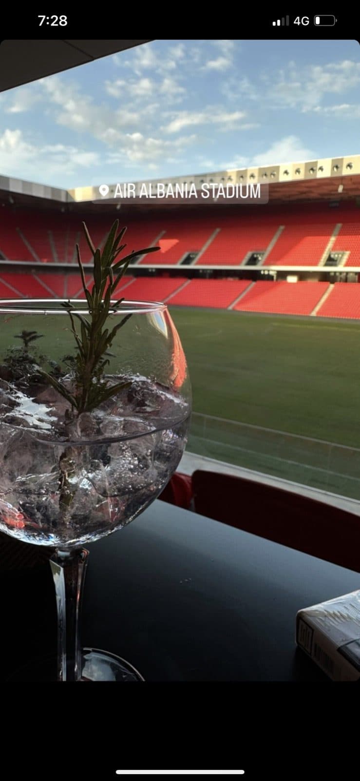 Guest photo of a gin cocktail with the pitch behind
