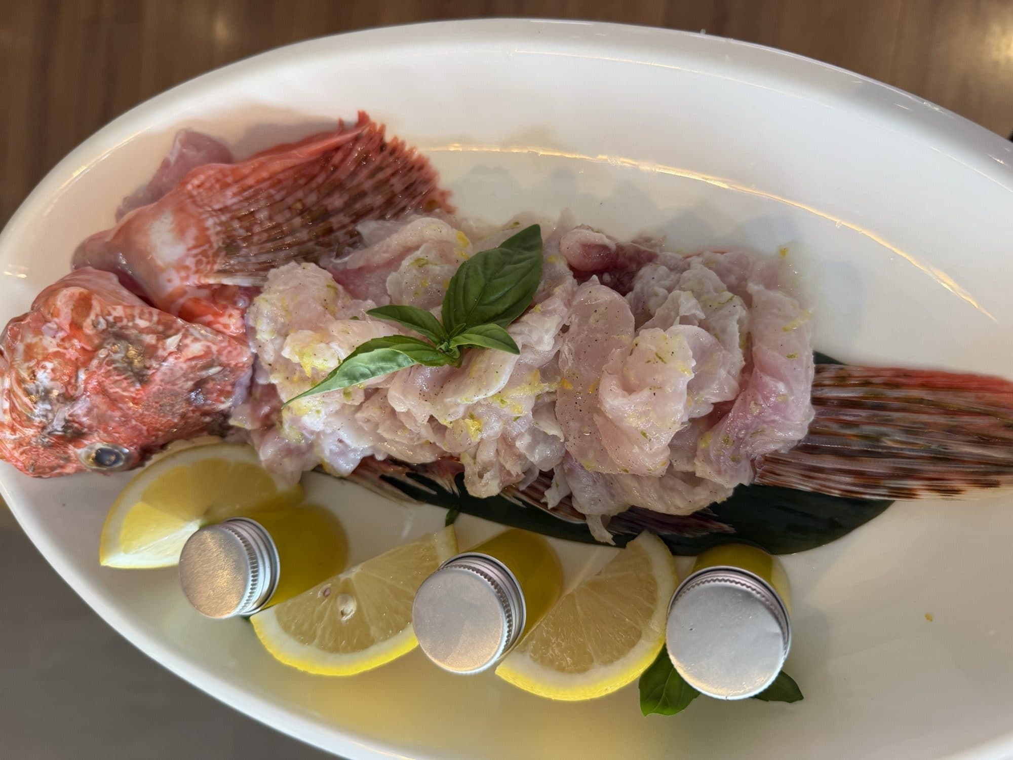 Scorpionfish crudo platter with citrus and oil